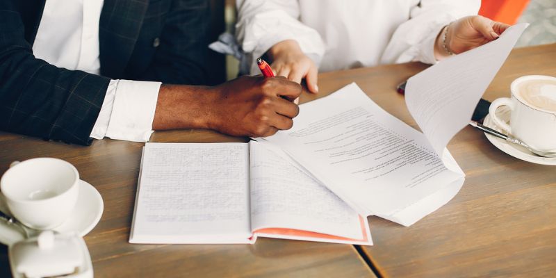 lawyer signing papers