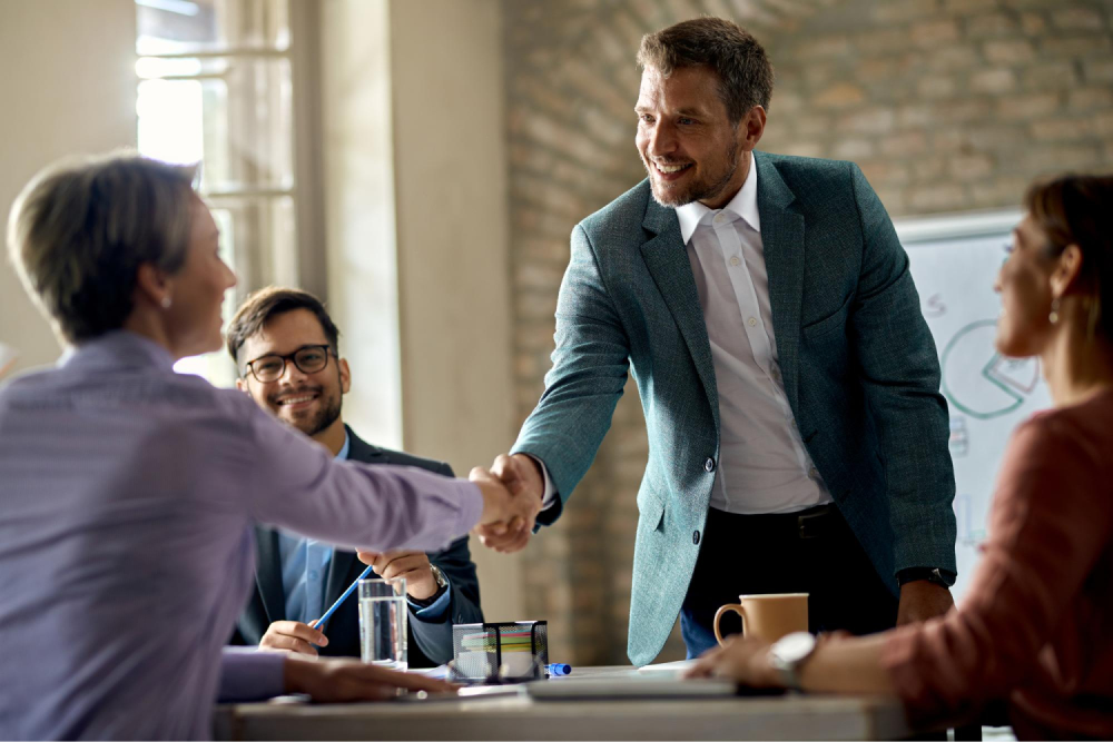 Businessman shaking hands with colleague